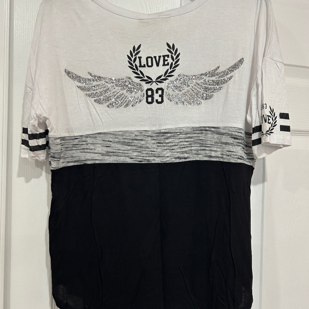 23 Lovestreet size large white and black shirt.